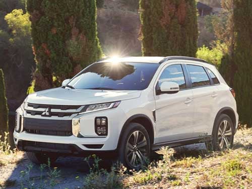 2023 Mitsubishi Outlander Sport driving on a Texas dirt road